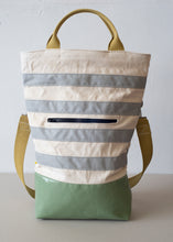 Load image into Gallery viewer, The Urban Field bag has a 4inch gusset, wide enough to stand upright when loaded. Fully stretched out the bag is 21" from the bottom to the rim, (showing the yellow strap handle version).