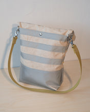 Load image into Gallery viewer, The snap at the back opens to a deep pocket. At 14", most laptops slip right in.