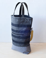 Load image into Gallery viewer, The Urban Field bag has a 4inch gusset, wide enough to stand upright when loaded. Fully stretched out the bag is 21&quot; from the bottom to the rim.
